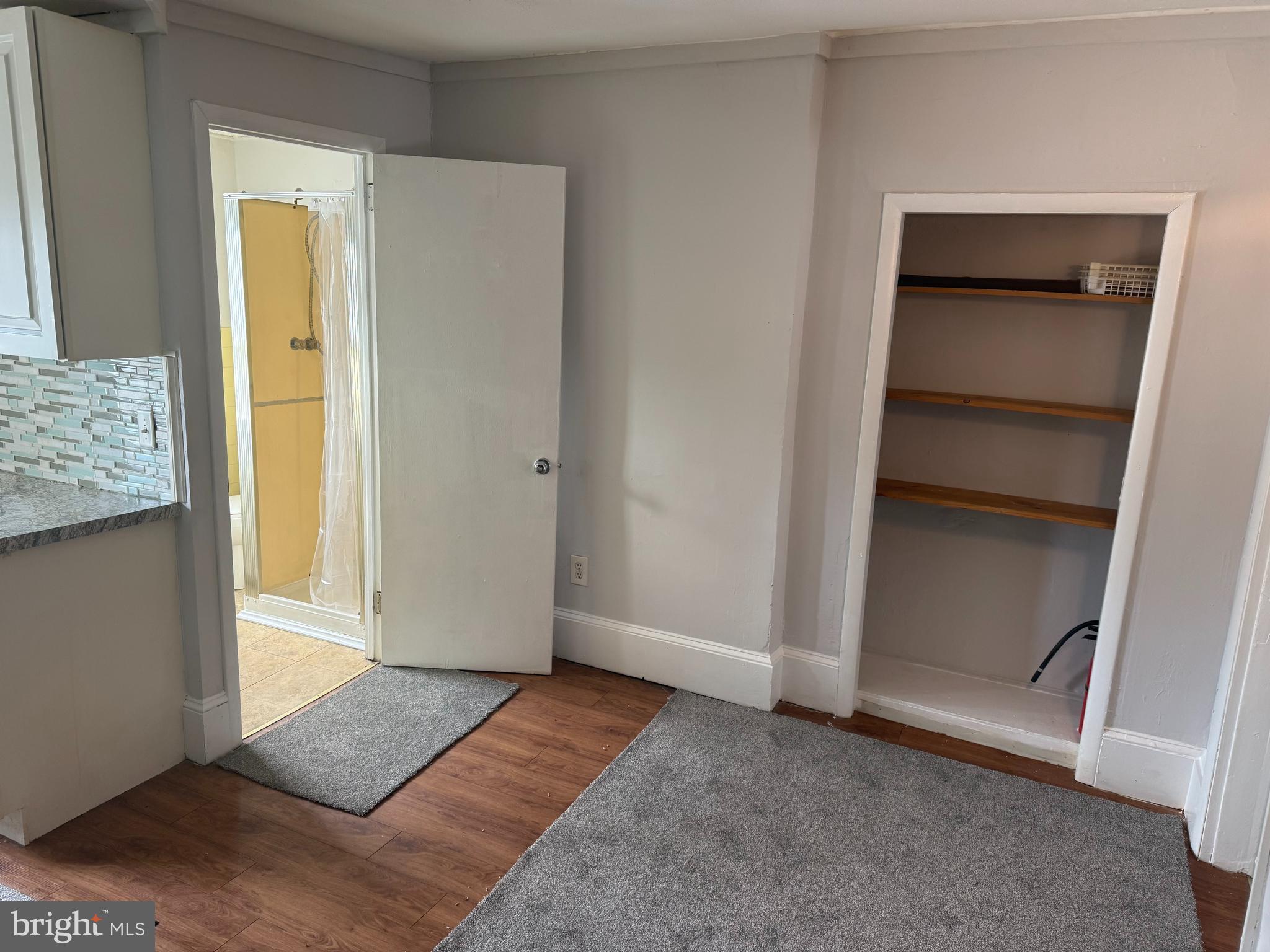 116 Walnut Street Bordentown, NJ 08505 - Photo 6 of 13 a view of an empty room with closet and a window