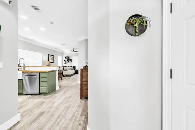 a view of a kitchen with a fridge and a stove