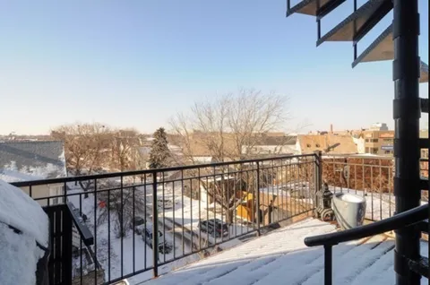 a view of a balcony with an outdoor space