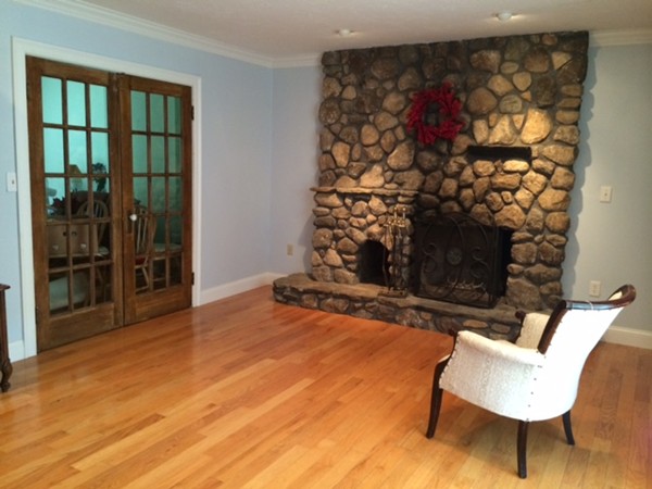 22 Ingram Road Leicester, MA 01611 - Photo 3 of 8 a view of a livingroom with furniture and a fireplace