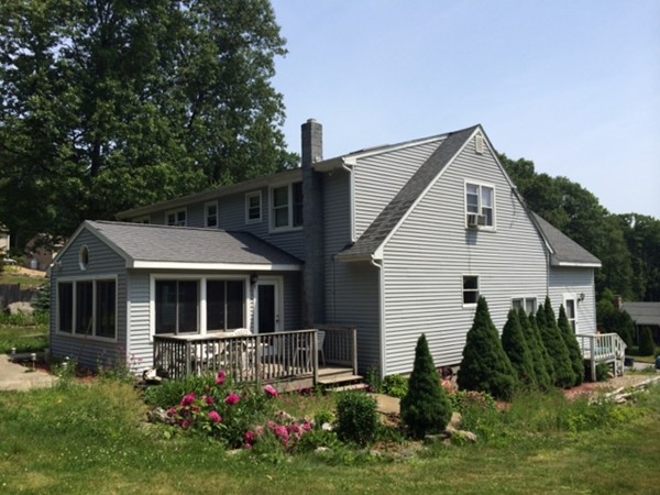 22 Ingram Road Leicester, MA 01611 - Photo 8 of 8 a front view of house with a garden