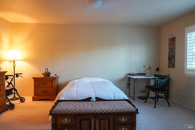 a view of a workspace with furniture