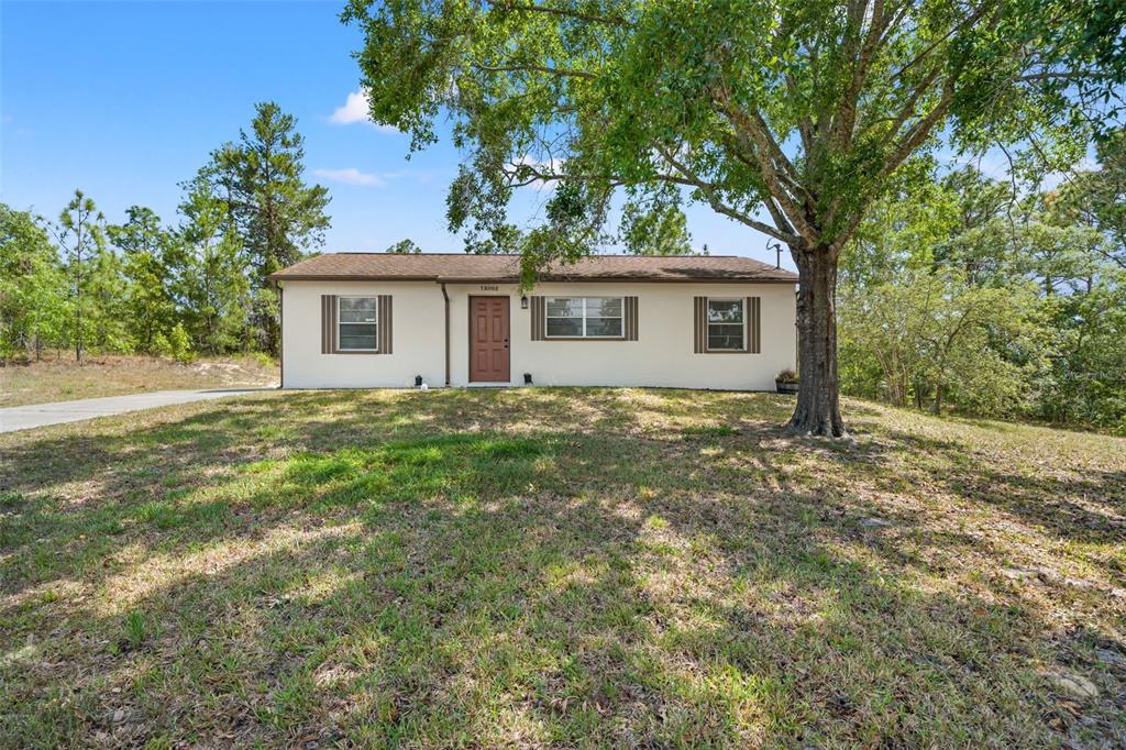 13002 Oneida Street Spring Hill, FL 34609 - Photo 1 of 36