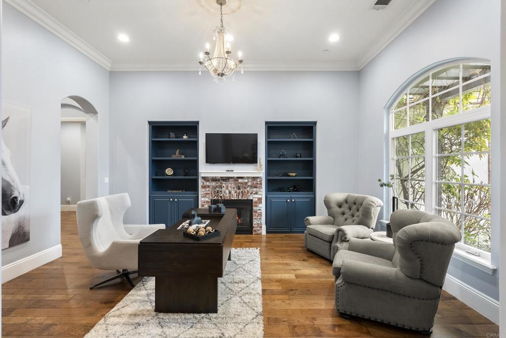 3401 Adams Run Encinitas, CA 92024 - Photo 12 of 18 a living room with furniture and a fireplace