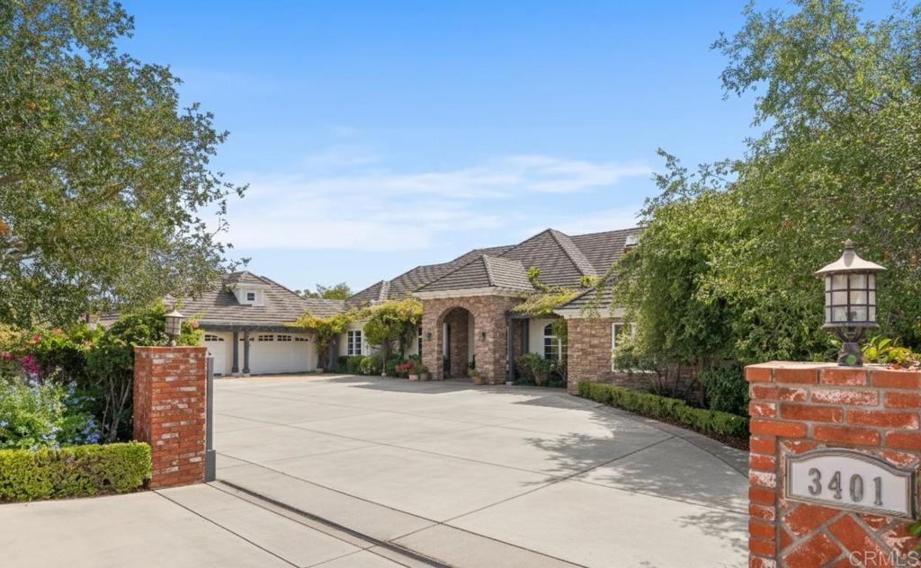 3401 Adams Run Encinitas, CA 92024 - Photo 2 of 18 front view of a house with a yard
