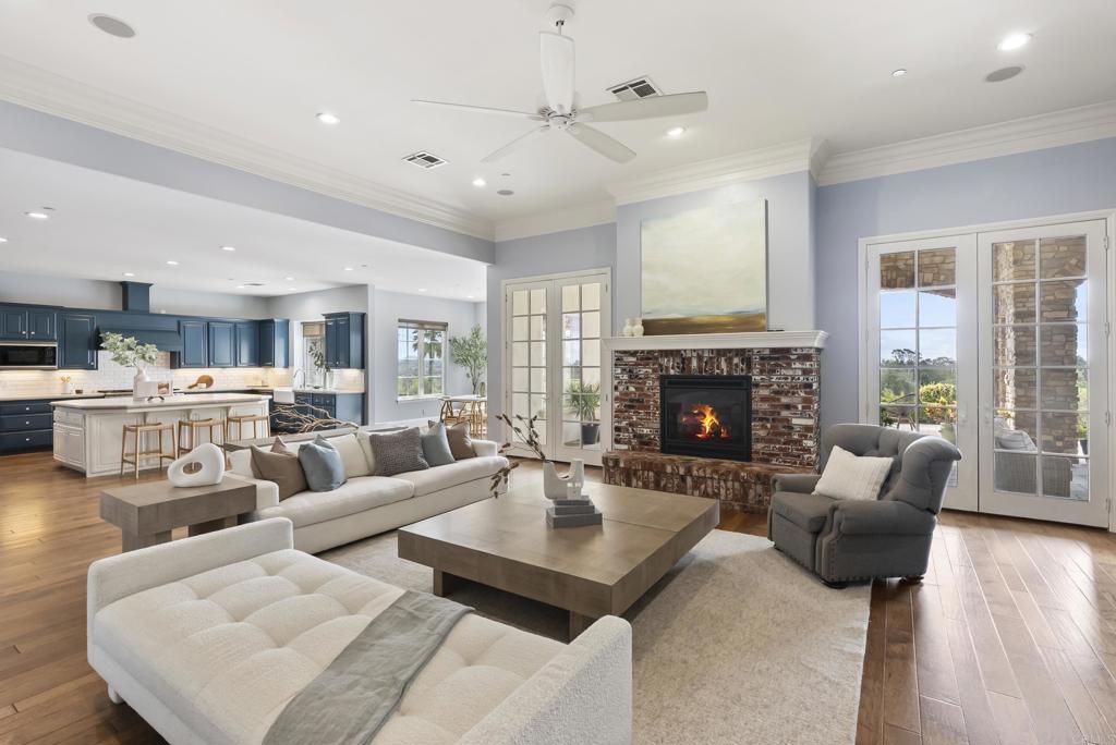 3401 Adams Run Encinitas, CA 92024 - Photo 3 of 18 a living room with furniture fireplace and window
