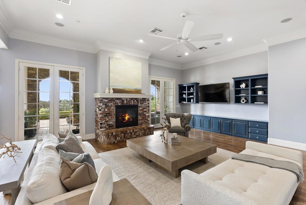 3401 Adams Run Encinitas, CA 92024 - Photo 6 of 18 a living room with furniture and a fireplace