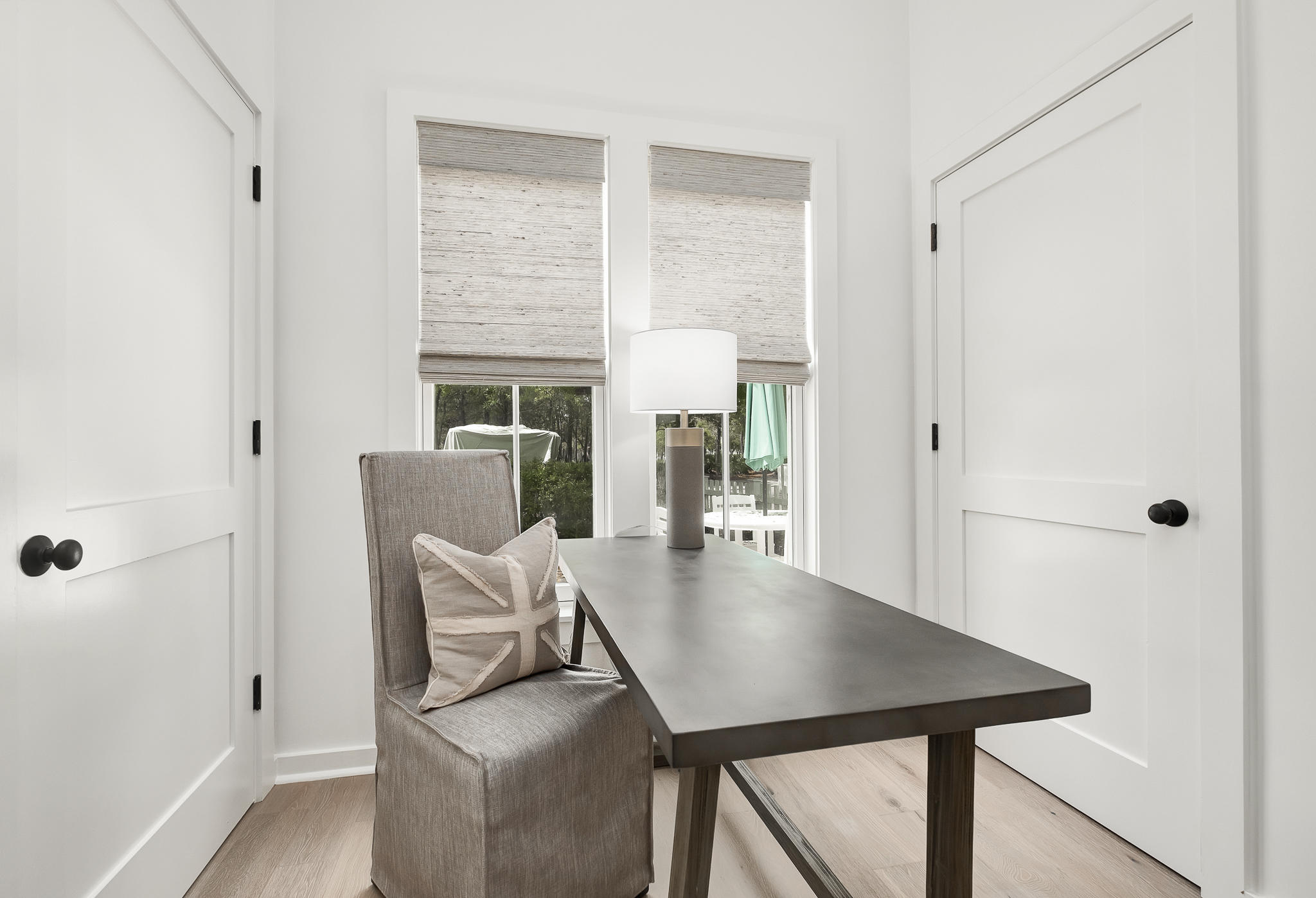 290 Salt Watersound, FL 32461 - Photo 17 of 45 a view of a dining room with furniture window and outside view