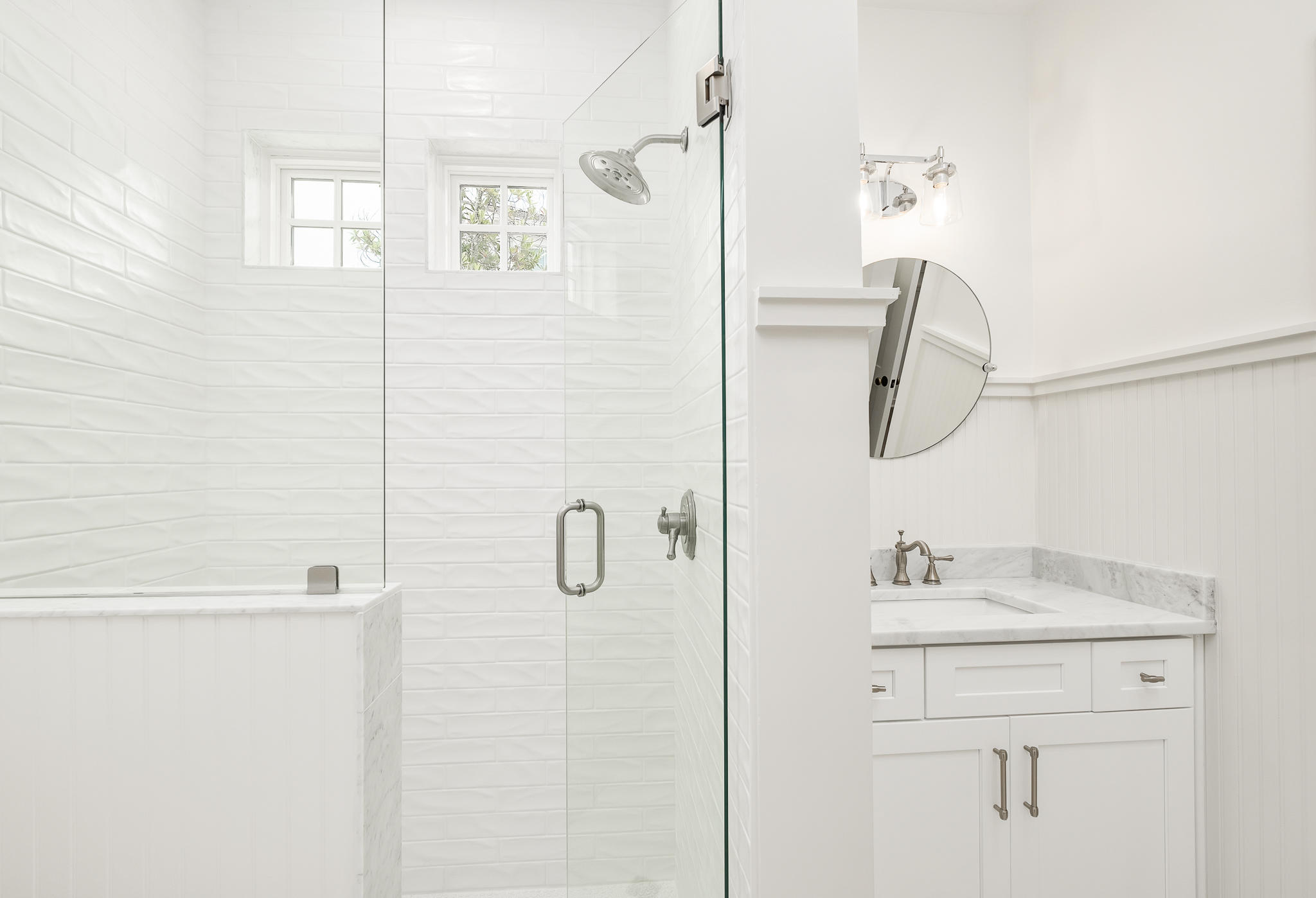 290 Salt Watersound, FL 32461 - Photo 19 of 45 a bathroom with a shower sink and mirror