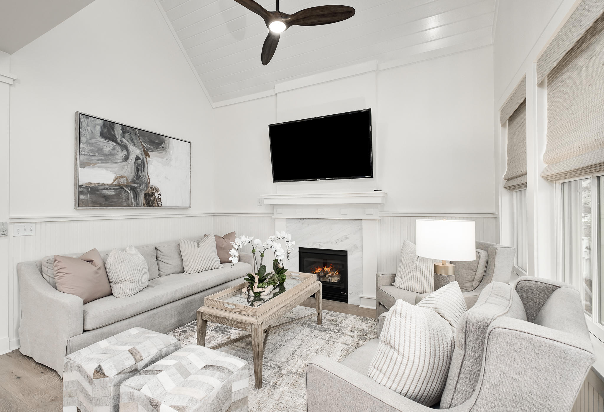 290 Salt Watersound, FL 32461 - Photo 3 of 45 a living room with furniture a fireplace and a flat screen tv