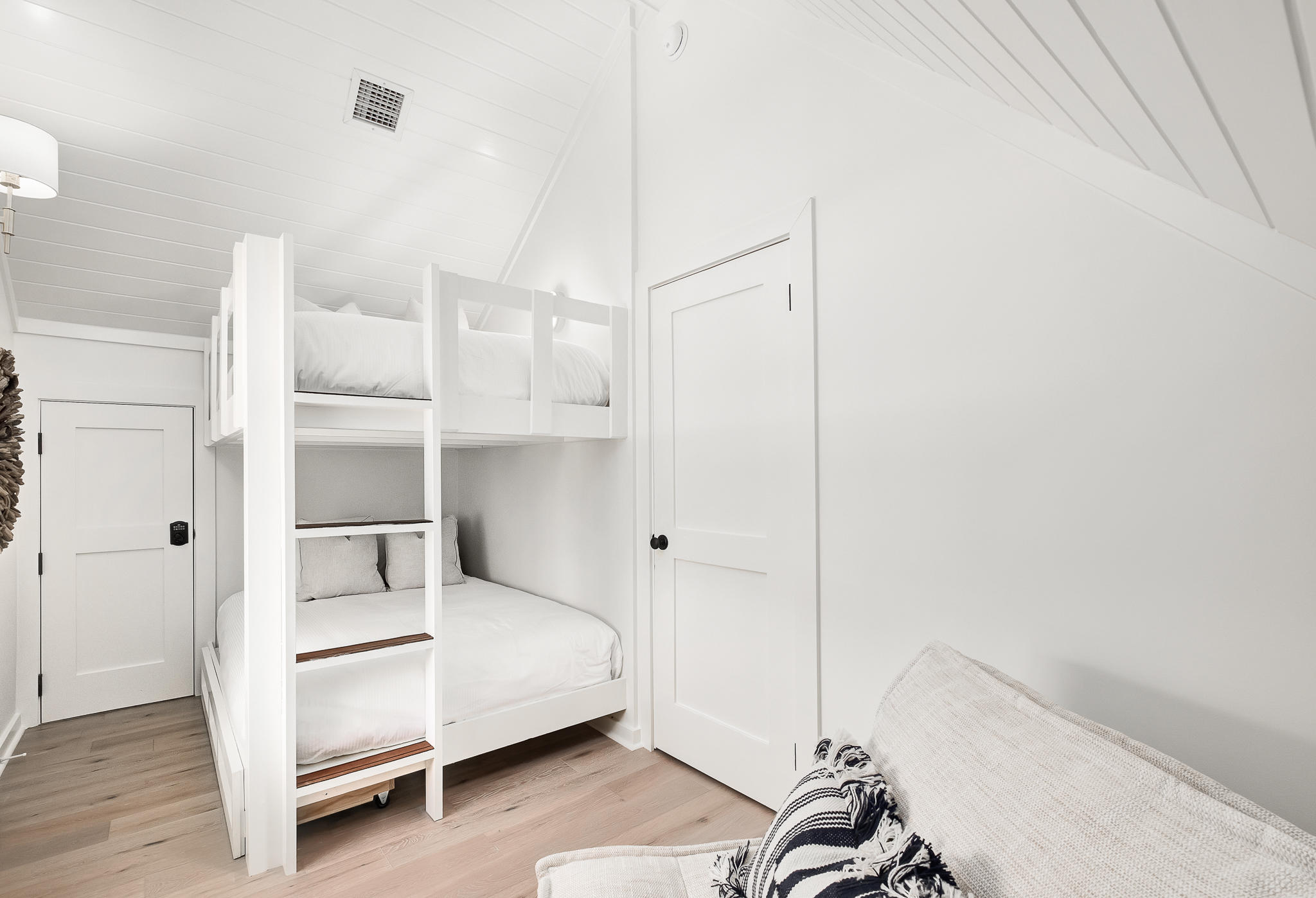 290 Salt Watersound, FL 32461 - Photo 30 of 45 a bedroom with a bed and a cabinets