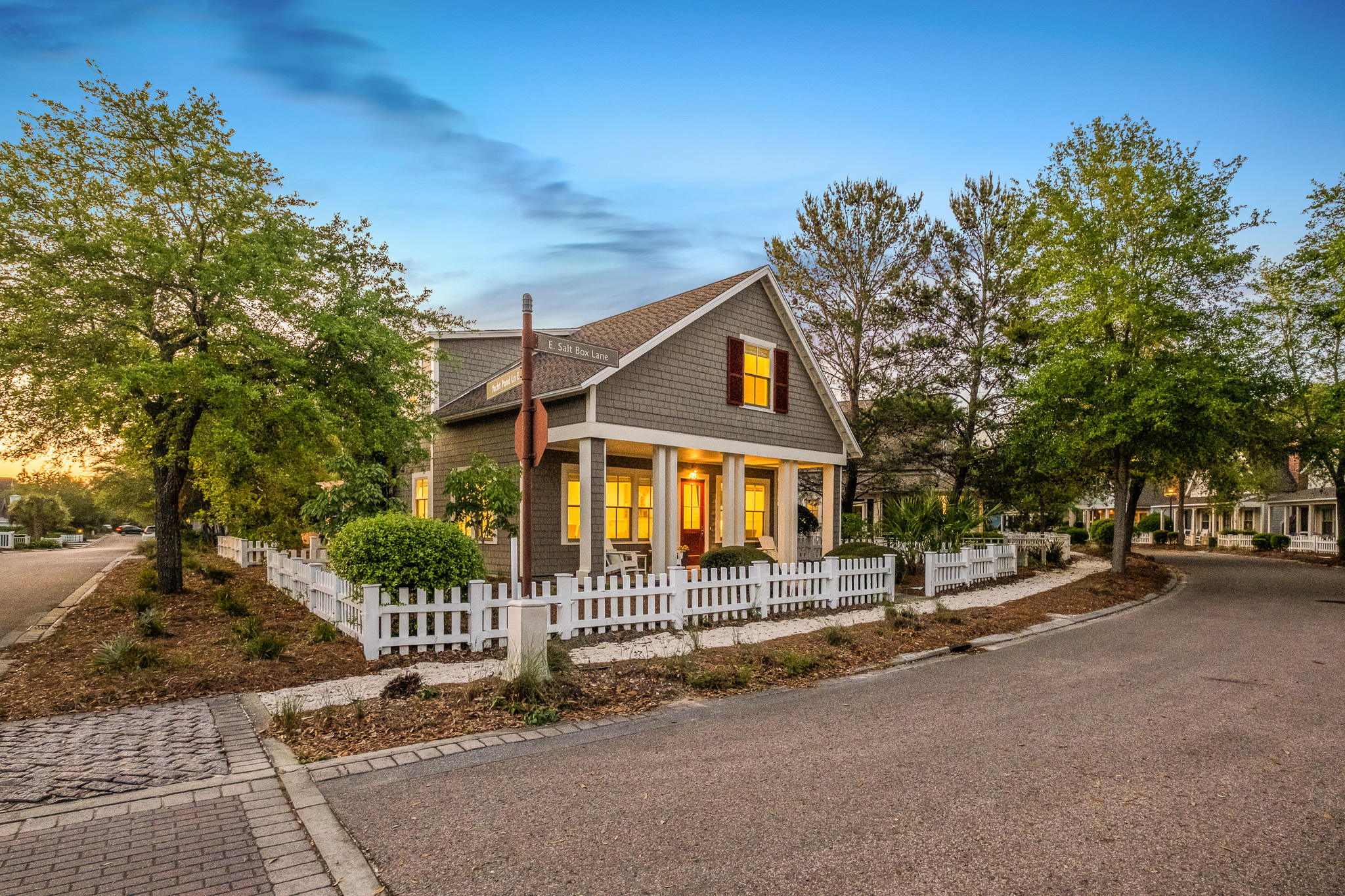 290 Salt Watersound, FL 32461 - Photo 41 of 45 a view of a house with a small yard and a large tree