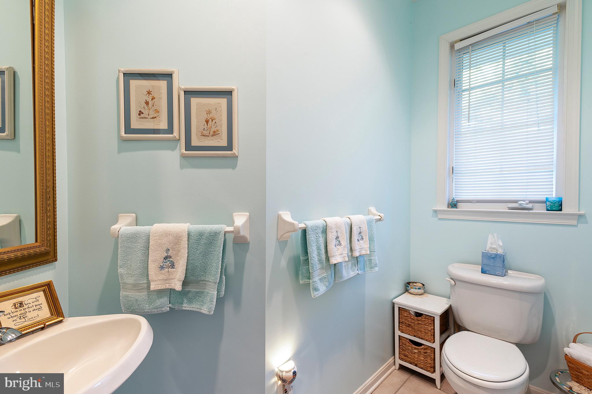 2420 SW Road Baltimore, MD 21234 - Photo 20 of 46 Half bath is tucked around the corner from kitchen