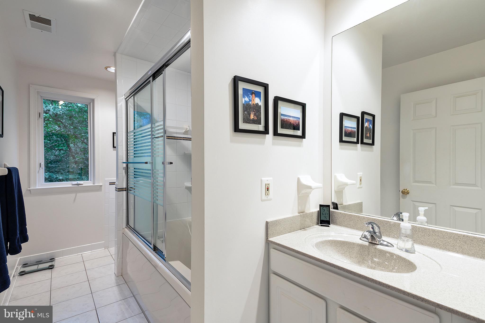 2420 SW Road Baltimore, MD 21234 - Photo 31 of 46 Hall bathroom with tub/shower enclosure.