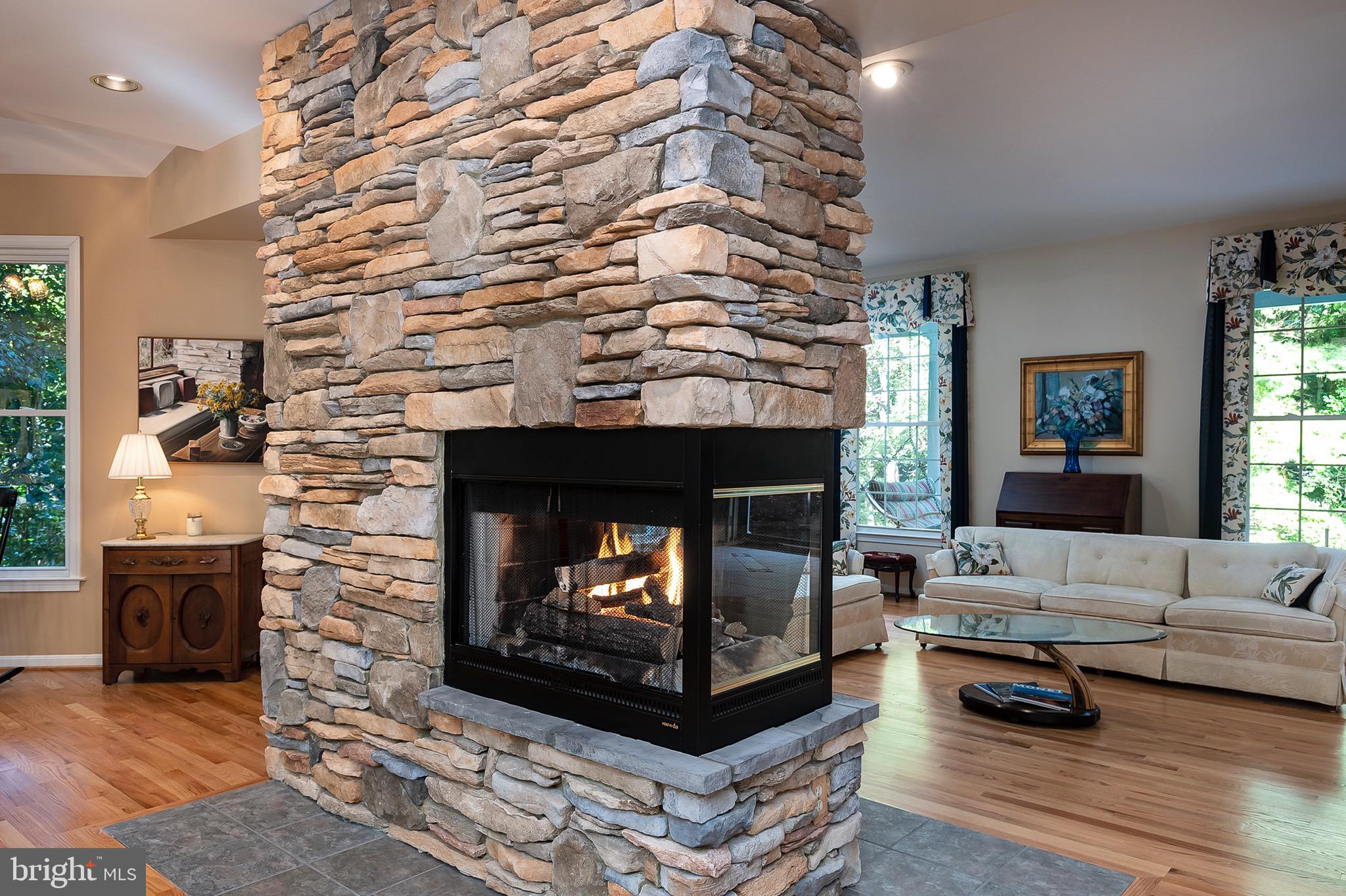 2420 SW Road Baltimore, MD 21234 - Photo 9 of 46 Wow! 3 sided gas firplace is amazing.