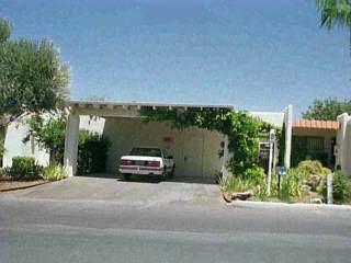 4820 East Fort Lowell Road, Unit K K Tucson, AZ 85712 - Photo 1 of 1 a car parked in front of a building
