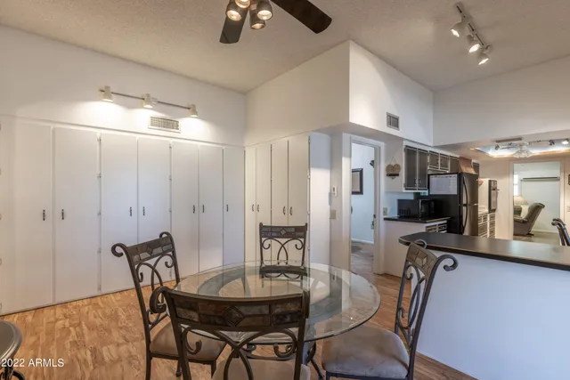 a view of a dining room with furniture