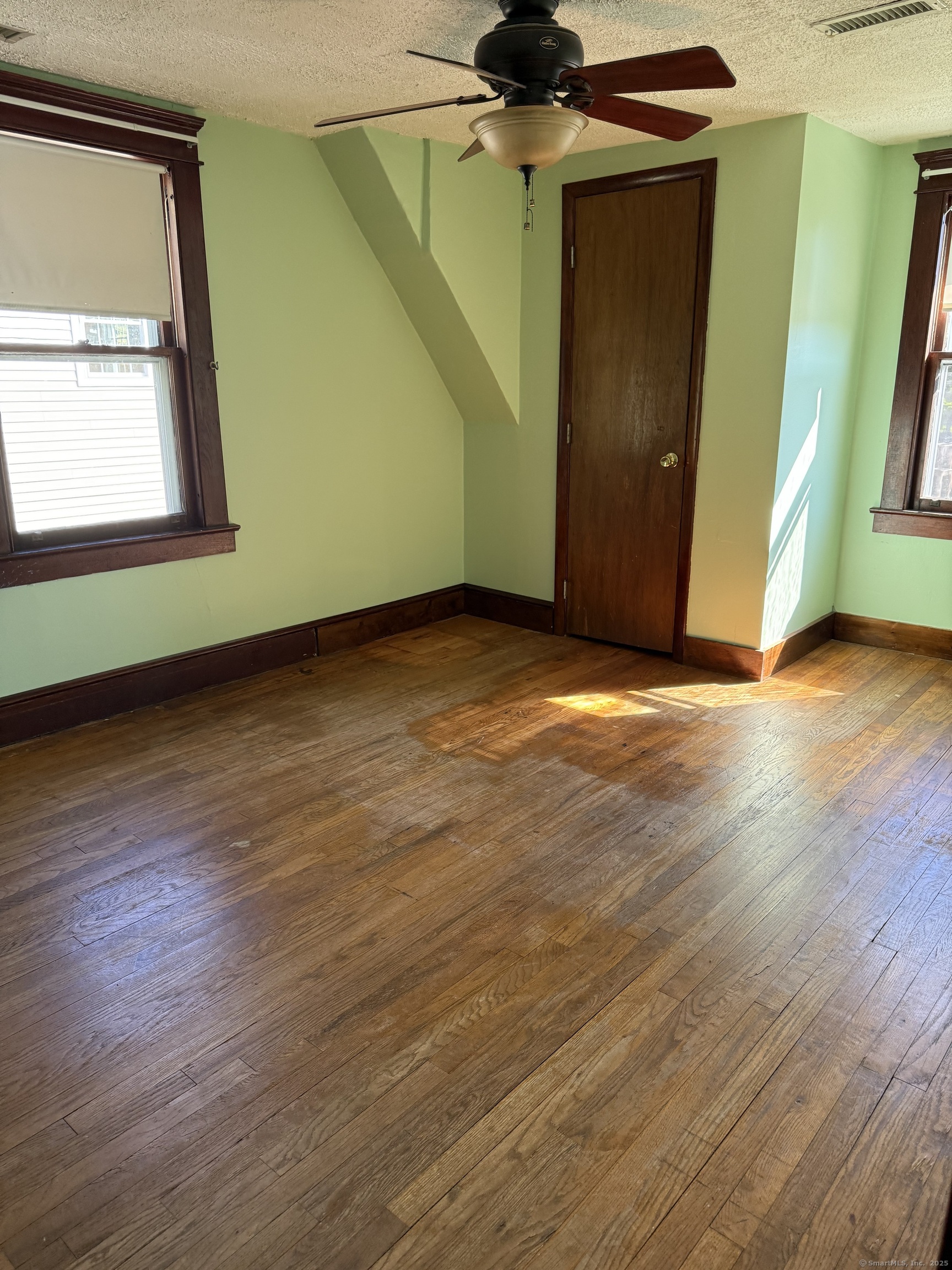 28 Galpin Street Naugatuck, CT 06770 - Photo 15 of 18 a view of a room with wooden floor and a window