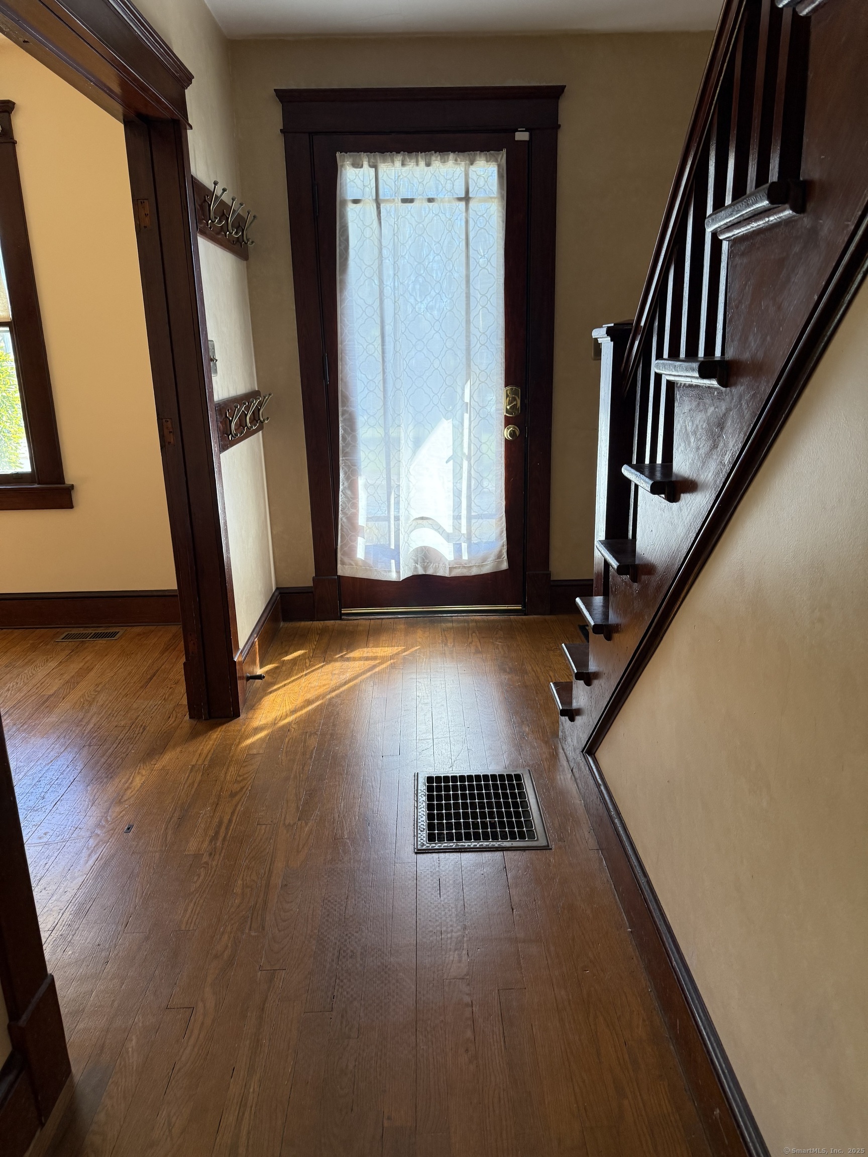 28 Galpin Street Naugatuck, CT 06770 - Photo 17 of 18 a view of an entryway with wooden floor and door
