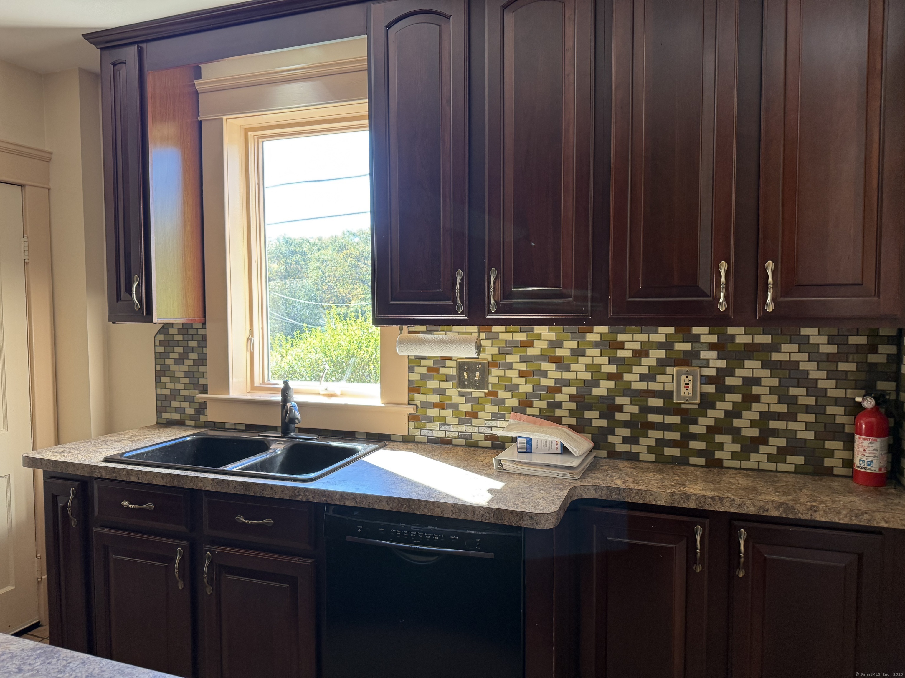 28 Galpin Street Naugatuck, CT 06770 - Photo 3 of 18 a kitchen with a sink and cabinets