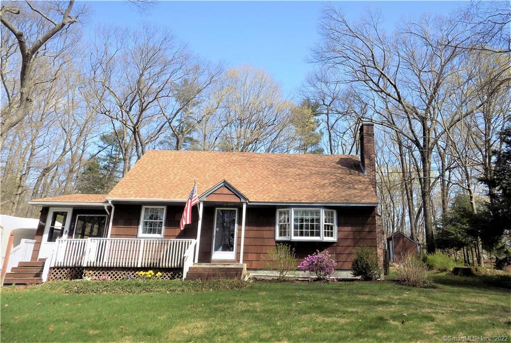 909 Swamp Road Coventry, CT 06238 - Photo 1 of 1 a front view of a house with a yard