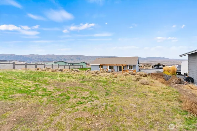 a view of houses with outdoor space and swimming pool