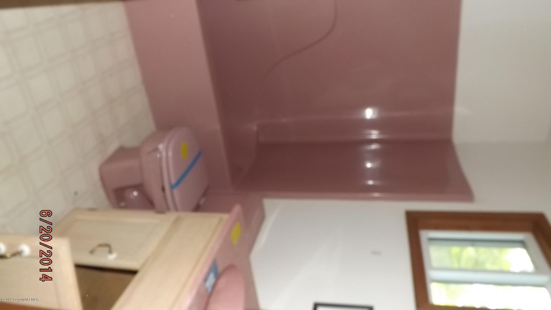 267 Coach Road Tobyhanna, PA 18466 - Photo 8 of 13 a bathroom with a toilet and a bathtub