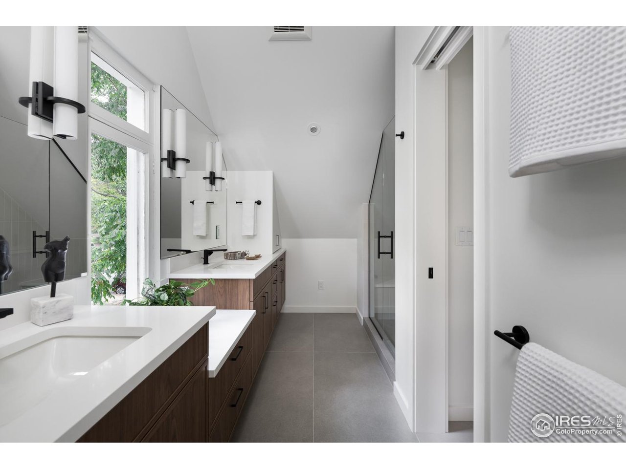 934 Spruce Street Boulder, CO 80302 - Photo 25 of 49 Custom double vanities in the primary suite.