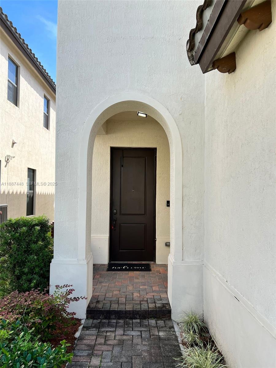 3214 West 97th Street Hialeah, FL 33018 - Photo 8 of 22 a view of entryway with yard