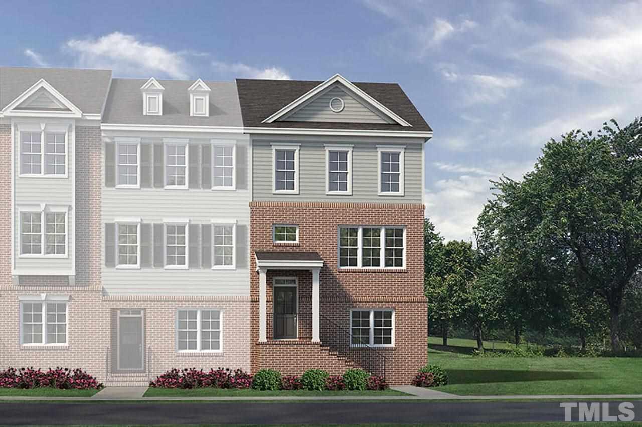 986 Gateway Commons Circle Wake Forest, NC 27587 - Photo 1 of 1 a front view of a house with a yard