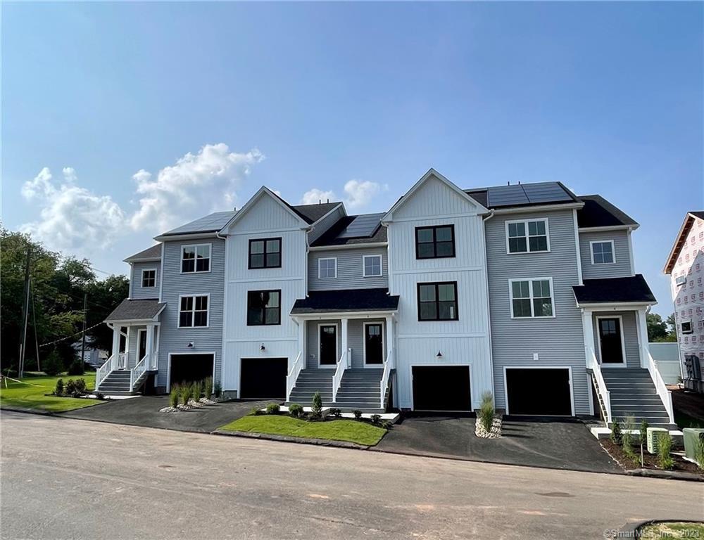 2 Soderman Way, Unit 2 Cheshire, CT 06410 - Photo 1 of 1 a front view of a building with street