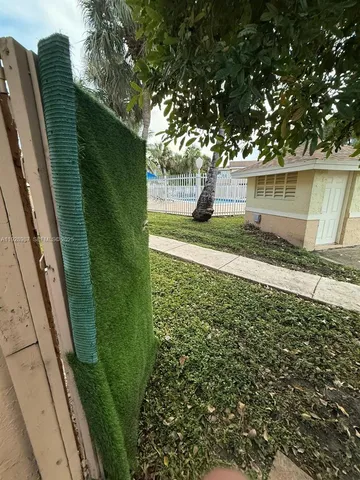 a view of a balcony with a garden