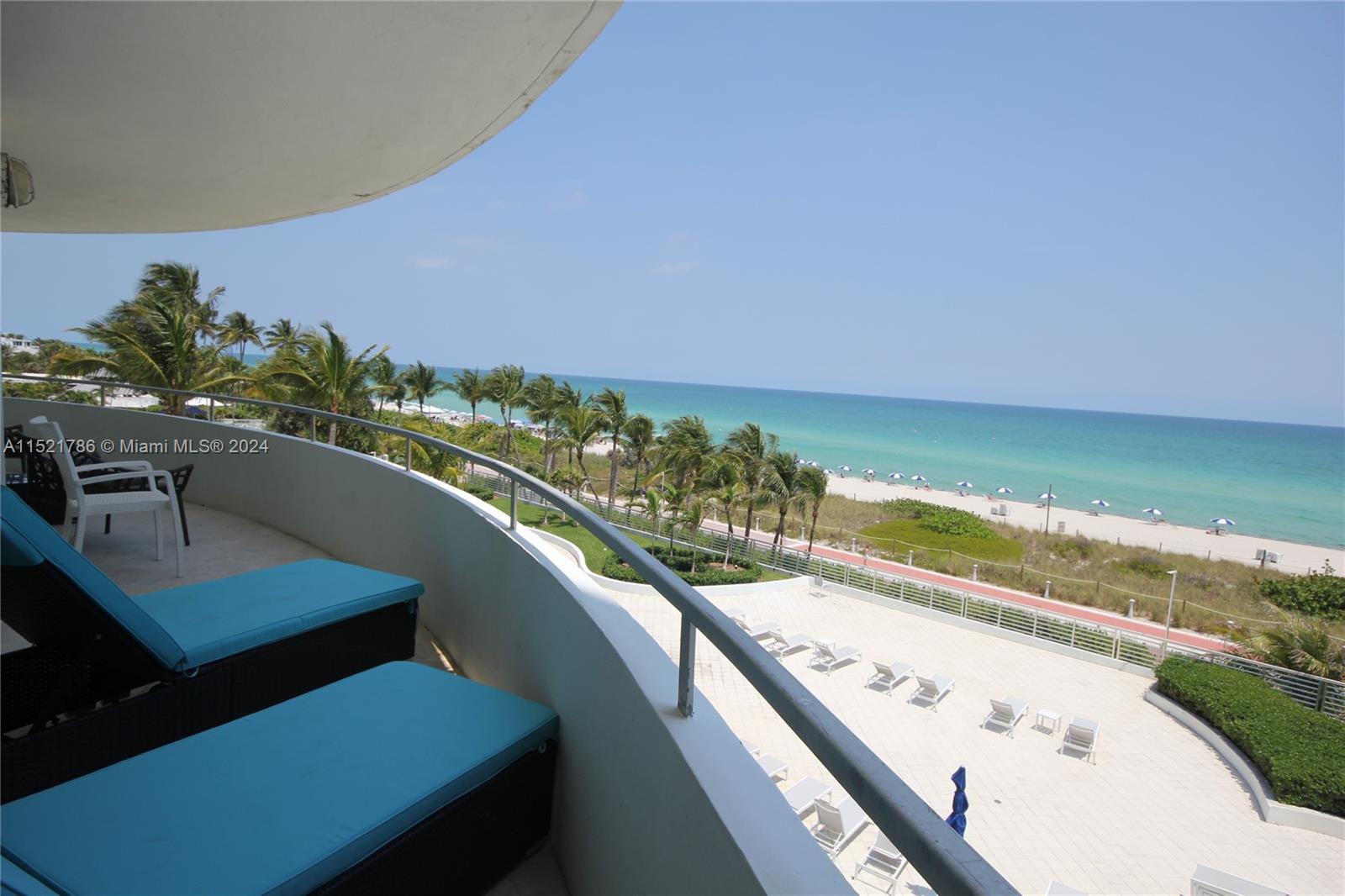 5151 Collins Avenue, Unit 532 Miami Beach, FL 33140 - Photo 32 of 62 a view of a balcony with chairs