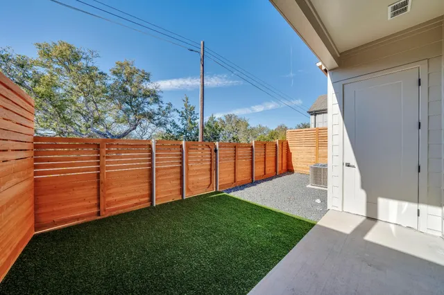 a view of a backyard with plants