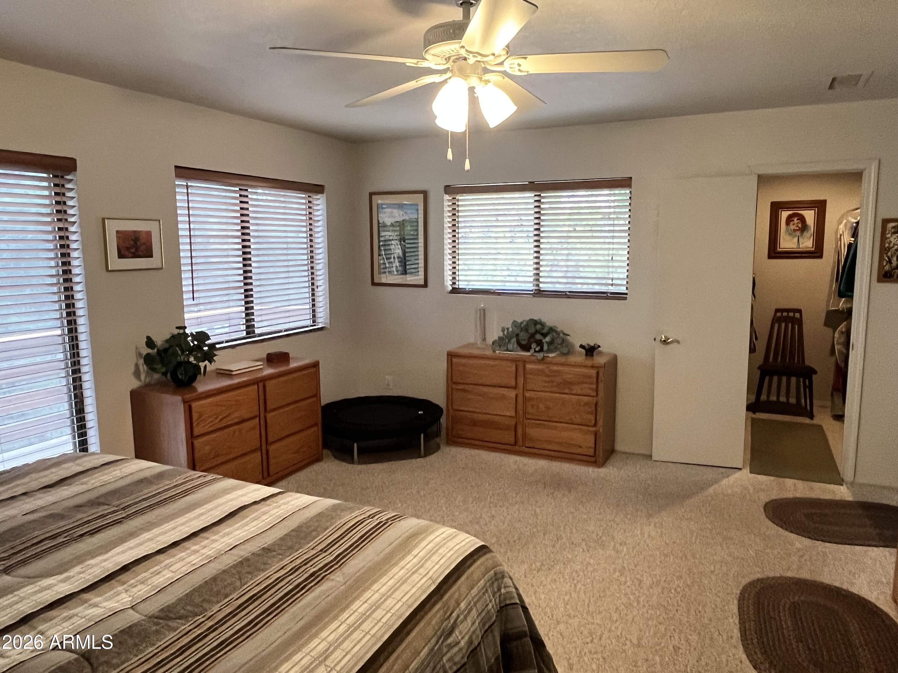 1006 North Matterhorn Road Payson, AZ 85541 - Photo 15 of 37 a bedroom with a bed and a dresser
