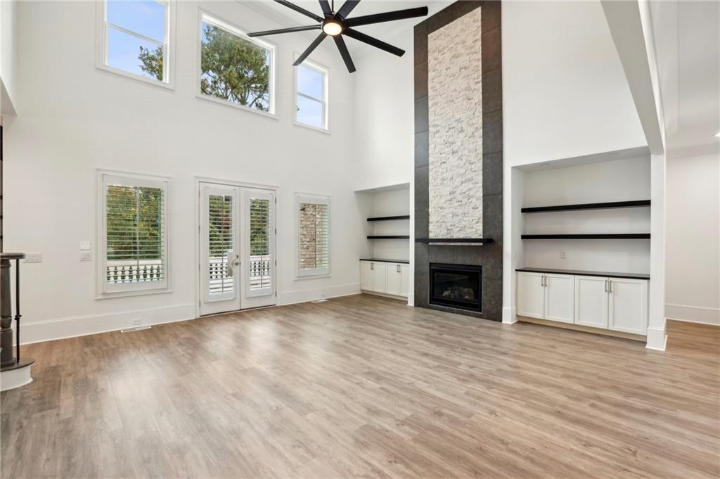 3750 Robinson Road Northeast Marietta, GA 30068 - Photo 12 of 57 a view of a room with wooden floor fireplace and windows