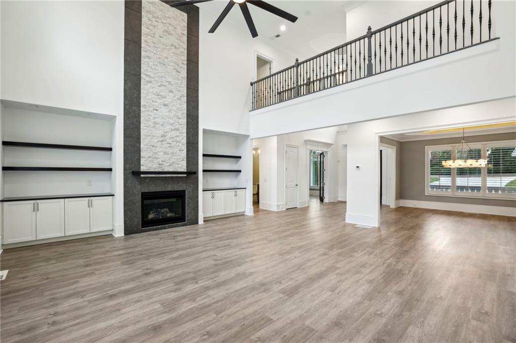 3750 Robinson Road Northeast Marietta, GA 30068 - Photo 13 of 57 a view of an empty room with wooden floor and a window