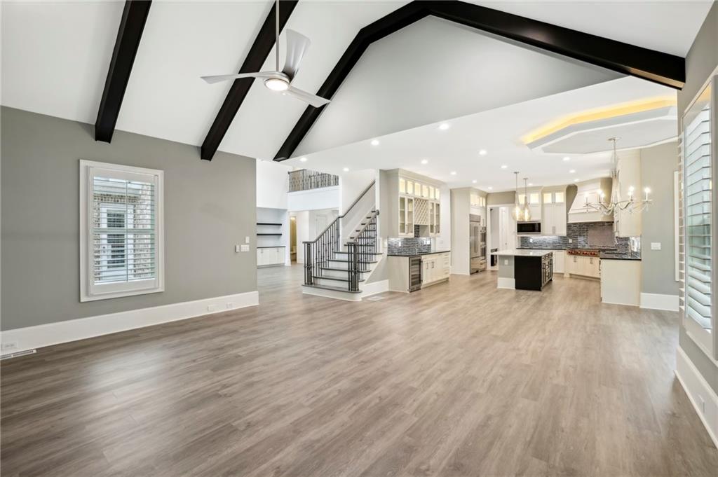 3750 Robinson Road Northeast Marietta, GA 30068 - Photo 17 of 57 a view of large kitchen with wooden floor and windows