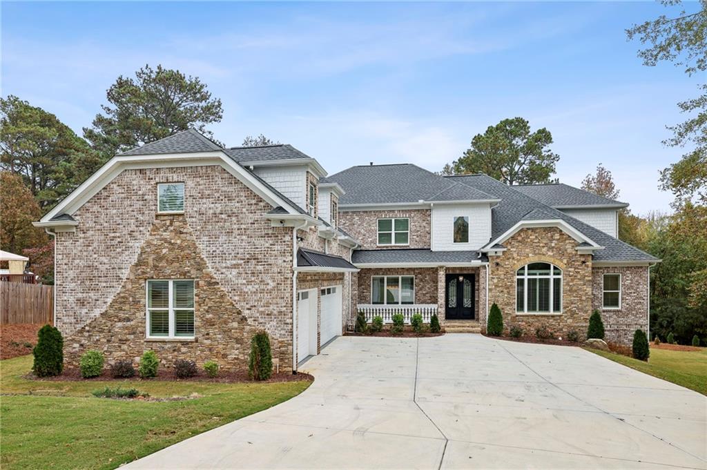 3750 Robinson Road Northeast Marietta, GA 30068 - Photo 2 of 57 front view of a house with a yard