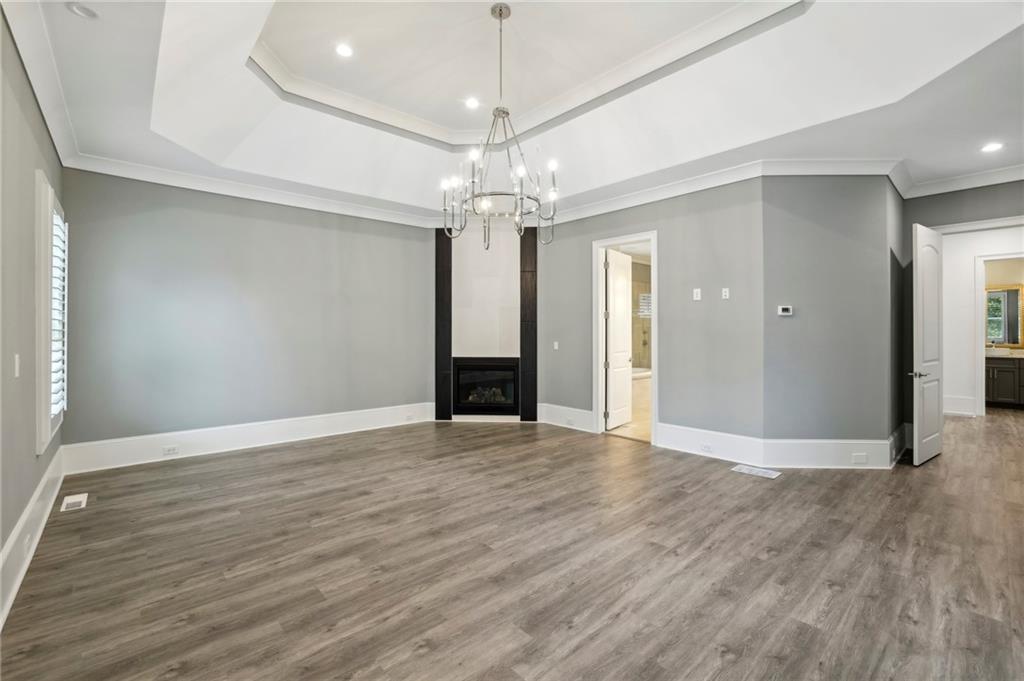 3750 Robinson Road Northeast Marietta, GA 30068 - Photo 32 of 57 a view of an empty room with wooden floor