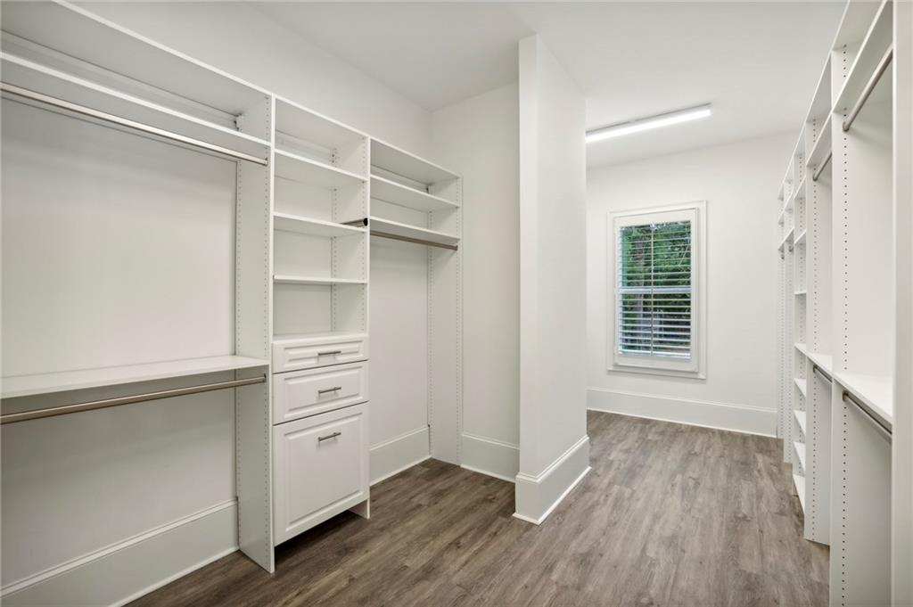 3750 Robinson Road Northeast Marietta, GA 30068 - Photo 36 of 57 a view of an empty room with a window and wooden floor