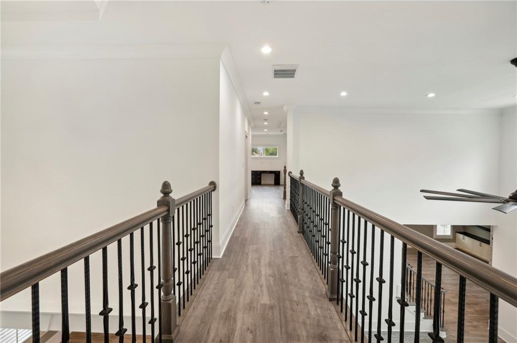 3750 Robinson Road Northeast Marietta, GA 30068 - Photo 37 of 57 a view of a hallway with wooden floor and staircase