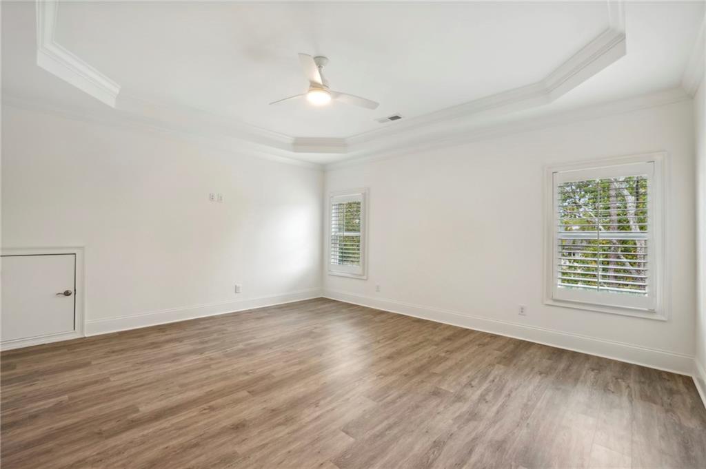 3750 Robinson Road Northeast Marietta, GA 30068 - Photo 38 of 57 wooden floor in an empty room with a window