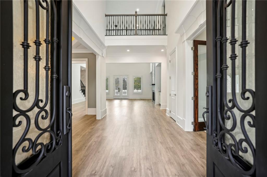 3750 Robinson Road Northeast Marietta, GA 30068 - Photo 4 of 57 a view of a hallway with wooden floor and staircase