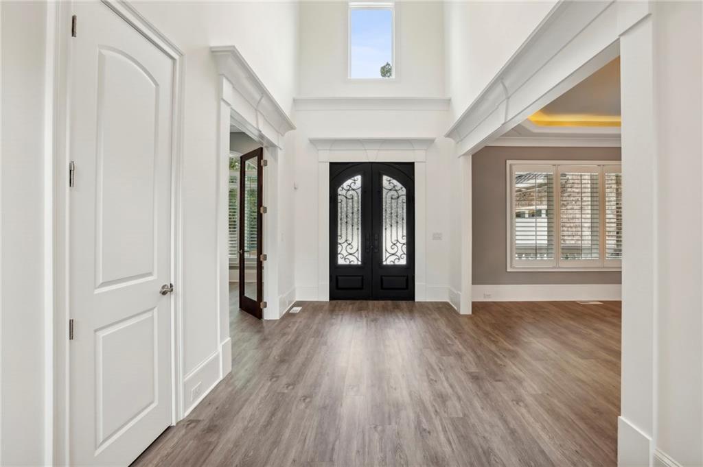 3750 Robinson Road Northeast Marietta, GA 30068 - Photo 5 of 57 a view of an entryway with wooden floor and door