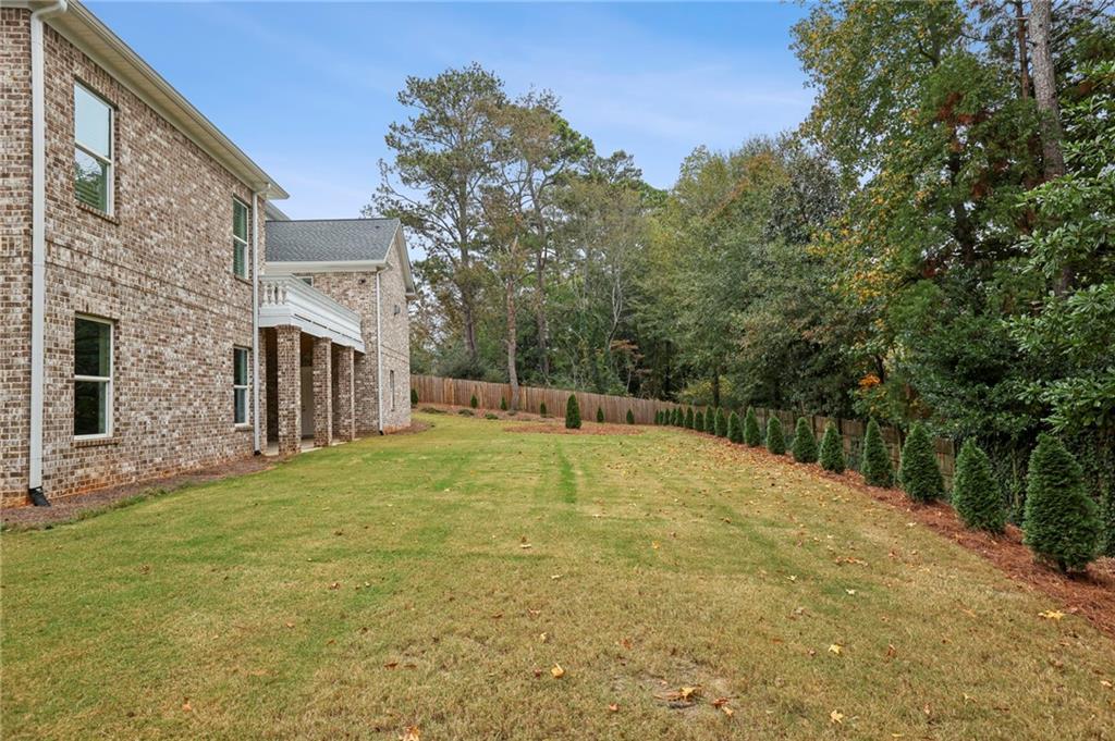 3750 Robinson Road Northeast Marietta, GA 30068 - Photo 51 of 57 a house with trees in front of it