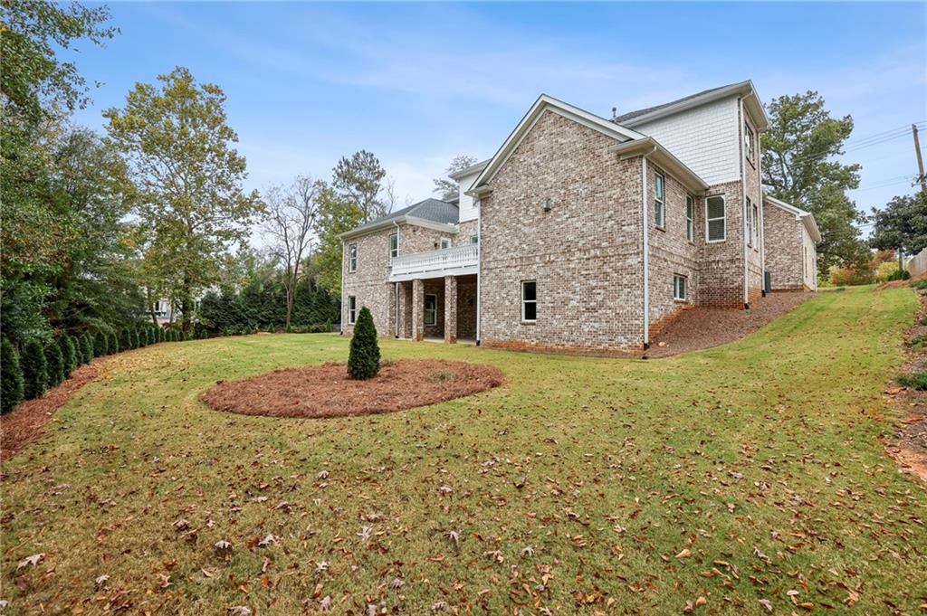 3750 Robinson Road Northeast Marietta, GA 30068 - Photo 53 of 57 a front view of a house with garden