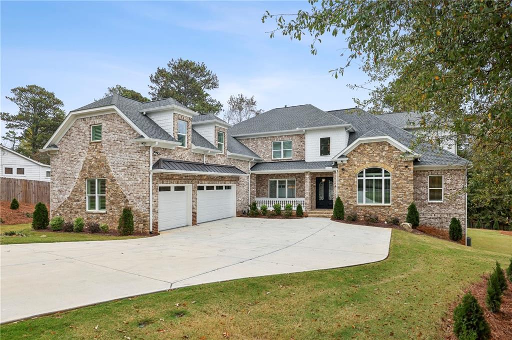 3750 Robinson Road Northeast Marietta, GA 30068 - Photo 56 of 57 a front view of a house with a yard