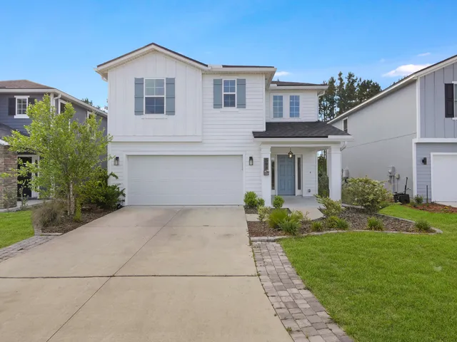 front view of house with a yard