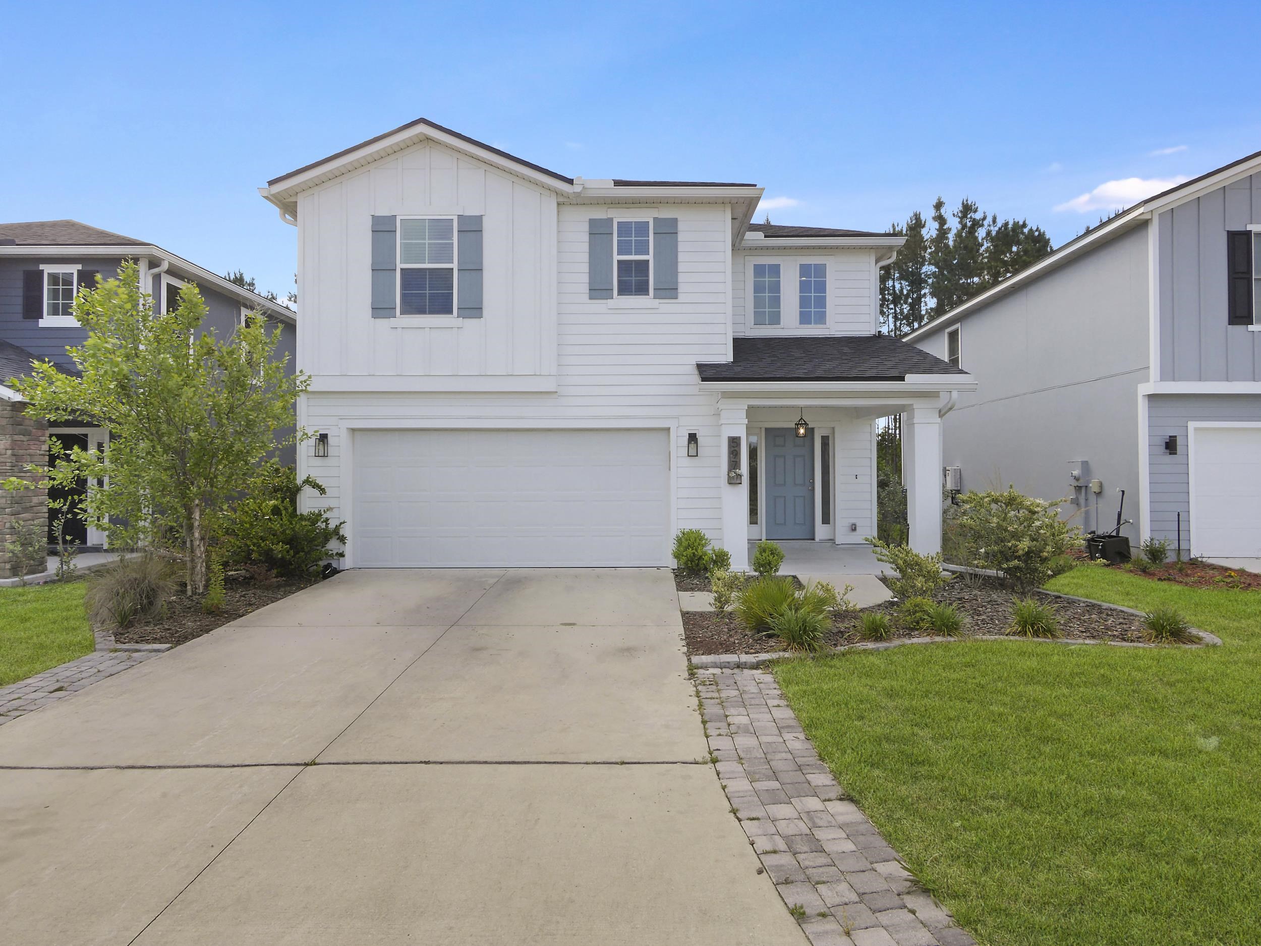 front view of house with a yard